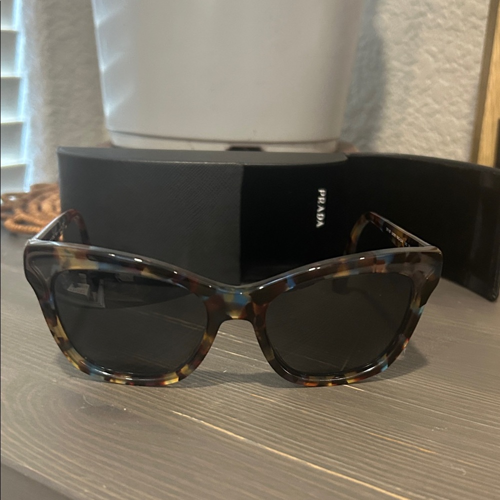 Prada Women’s Tortoiseshell Sunglasses with Dark Lenses